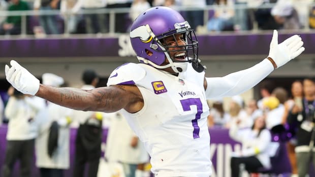 Vikings cornerback Patrick Peterson celebrates an interception during a 2022 game.